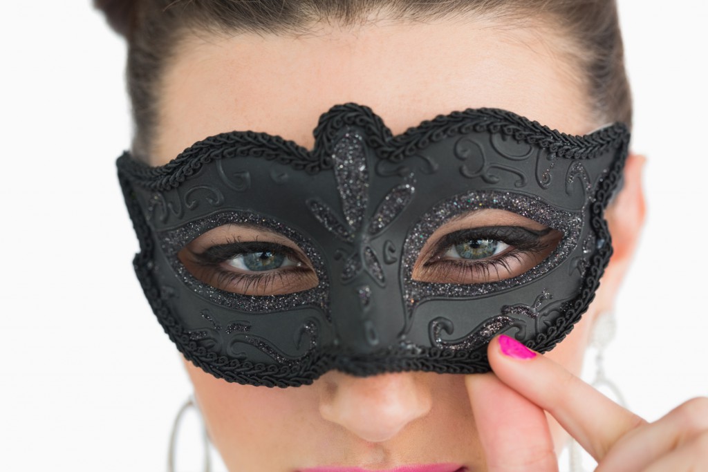 Woman wearing masquerade mask